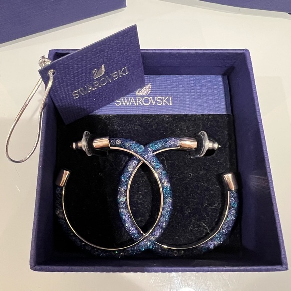 Swarovski Jewelry - Swarovski Blue stone/ silver Hoop Earrings- Brand New in box w tag